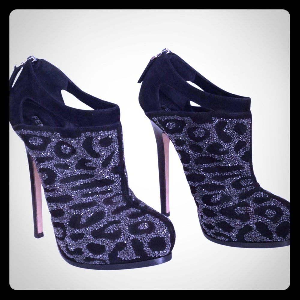 Black Fendi stiletto booties.